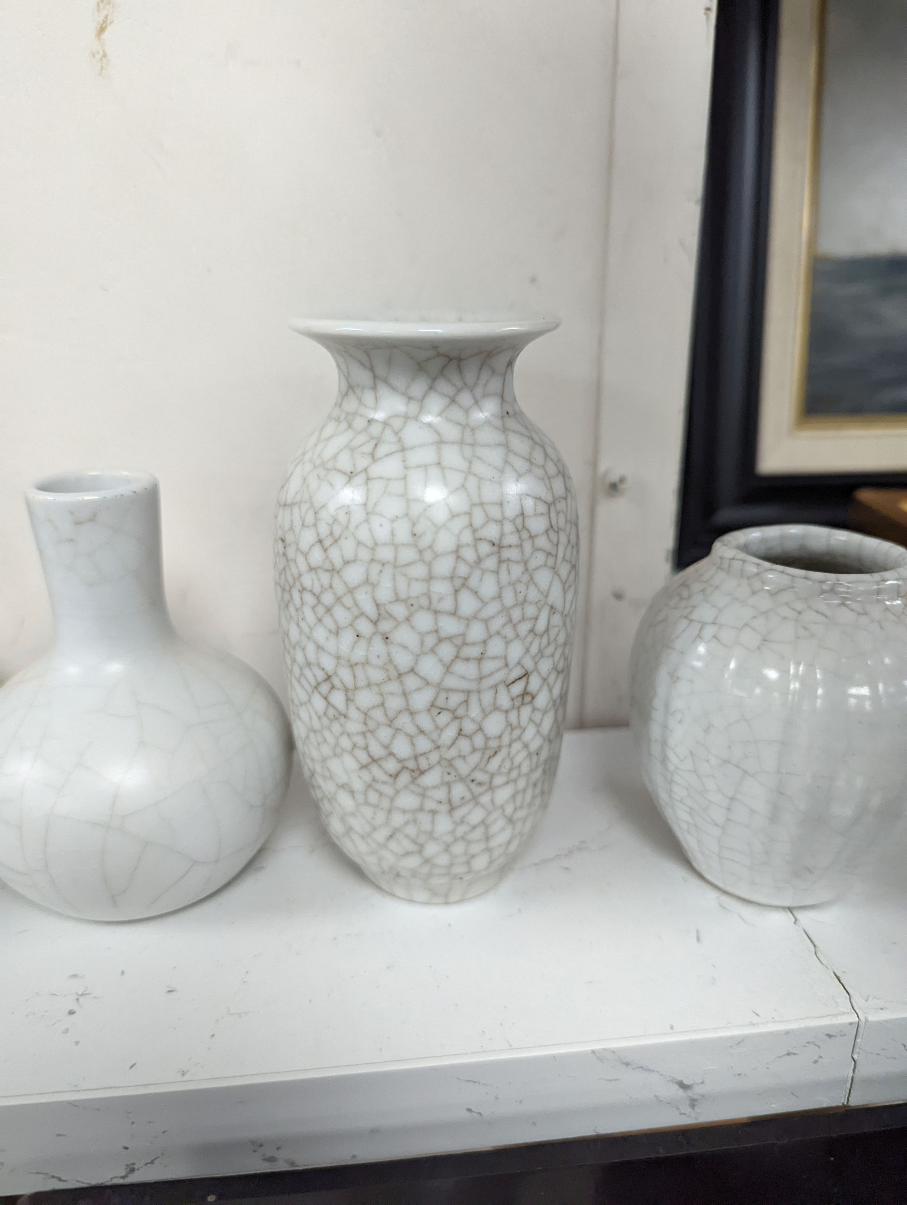 Four Chinese crackle glaze vases, tallest 16 cms high.